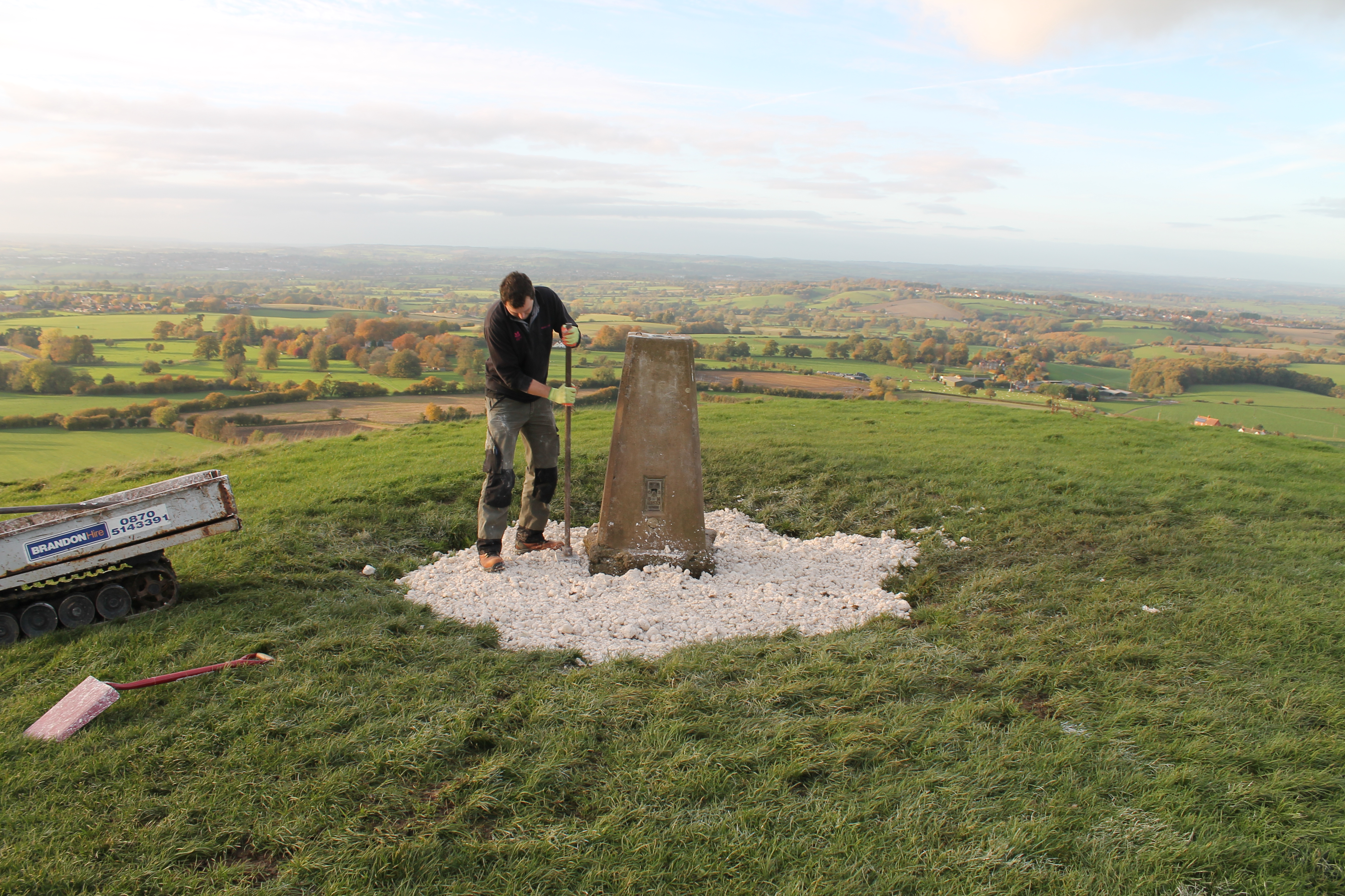 Paul tamping down the chalk around the OS Trig Station. It attracts a lot of erosion.