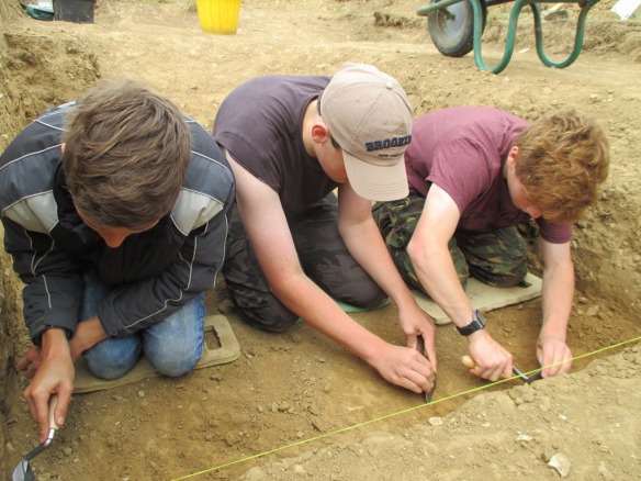 Students  excavating on site