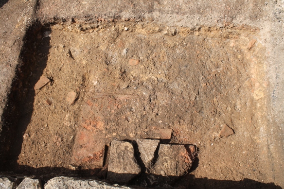 The stone and tile structure in trench A