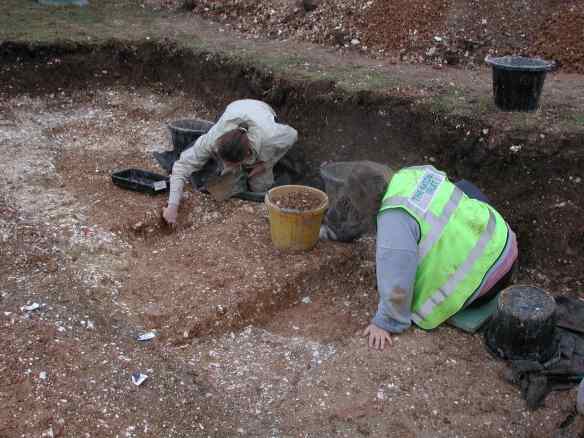 Excavating the ditch of a iron age round house, just inside the inner bank of Badbury Rings